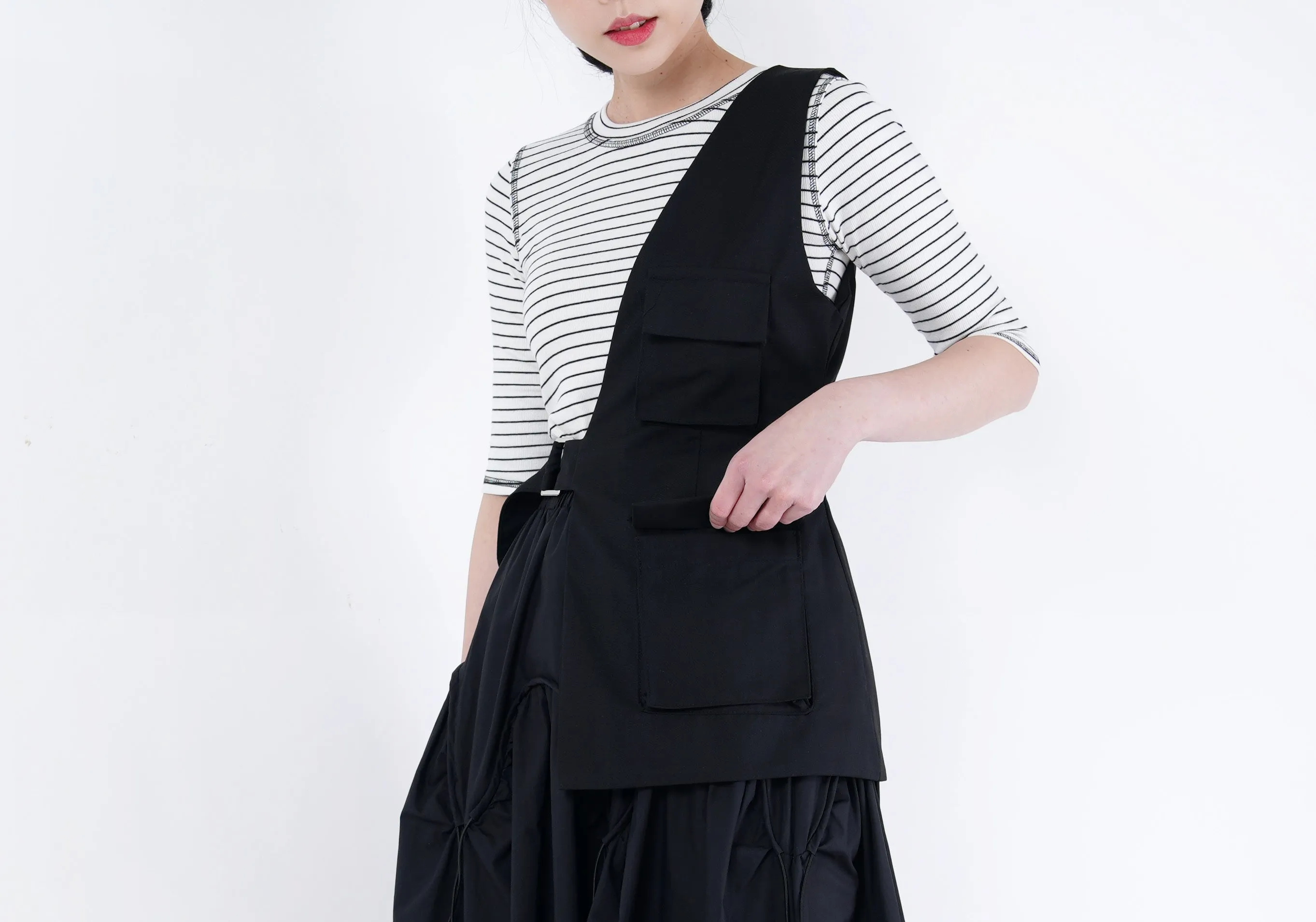 Black asymmetric cut vest w/ buckle