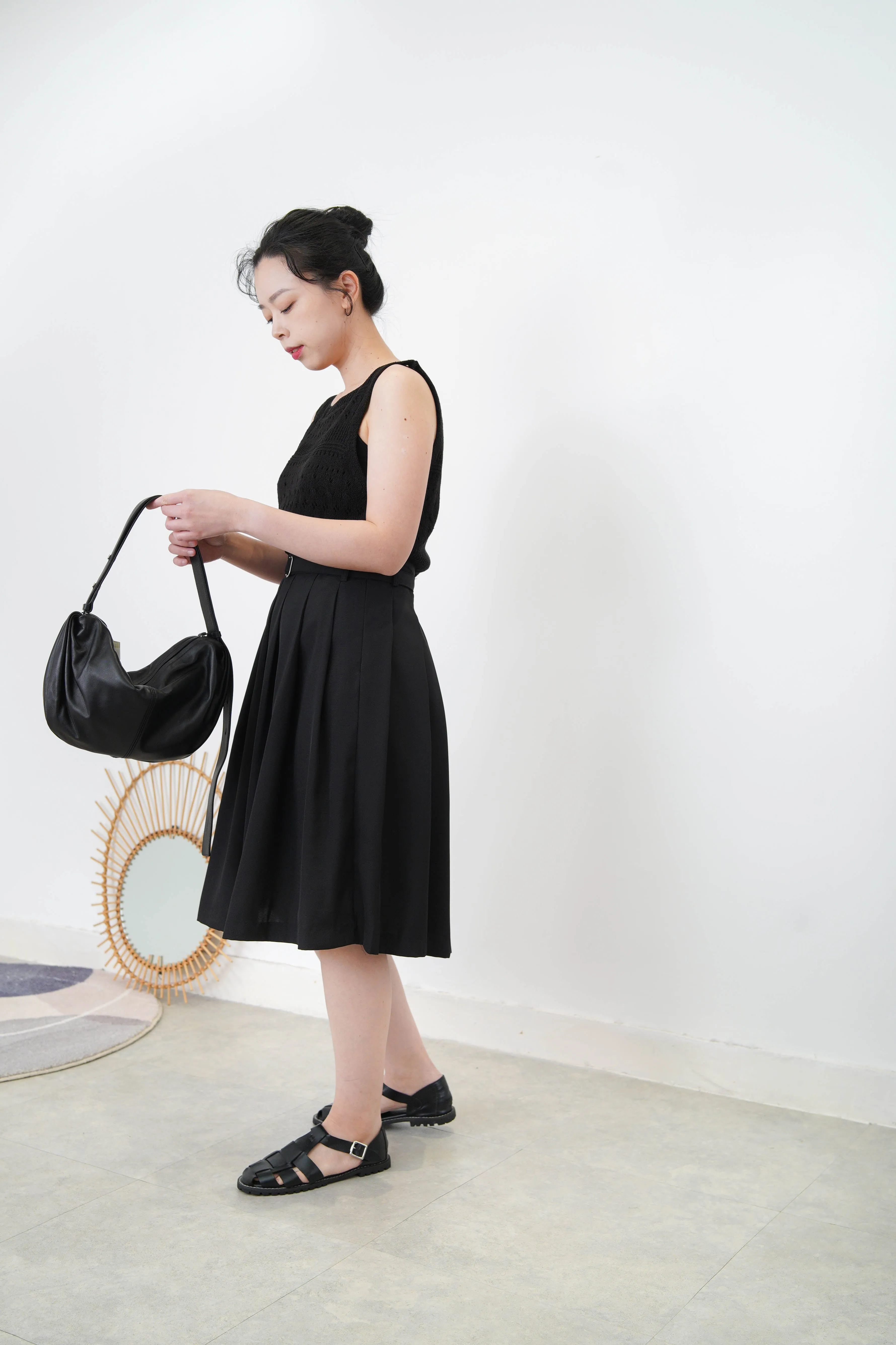 Black crochet knit vest in boat neck